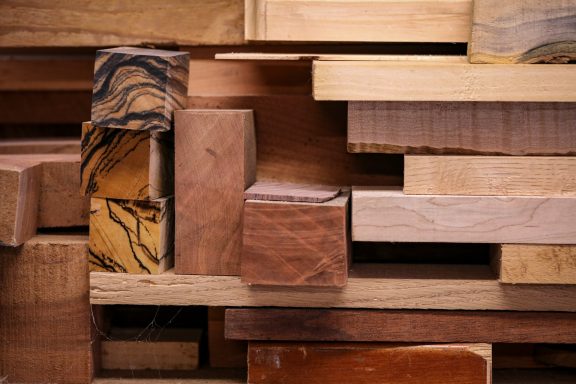 A variety of wooden blocks arranged in a stacked formation.